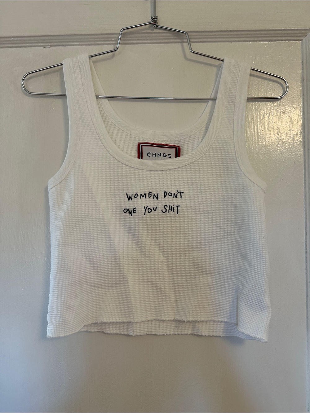 CHNGE White Ribbed Cropped Tank with Black Embroidered Slogan